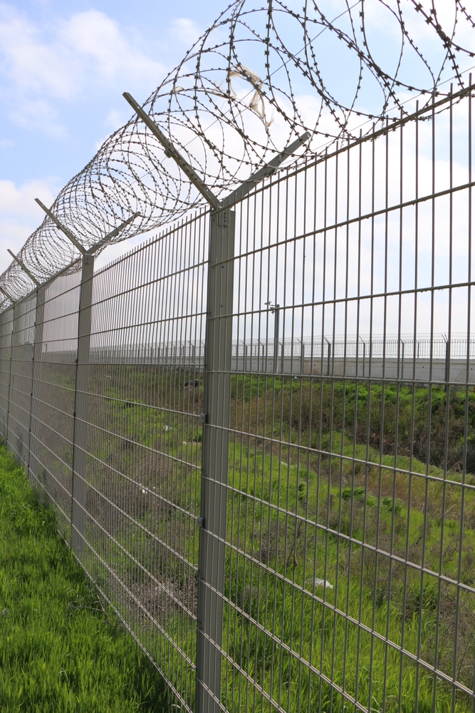 A picture of a Clearview fence around a field